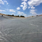Installing geomembrane liner