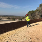 Hydraulically applying mulch additive.