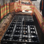 R-Tank UrbanForest Soil Cells installation beneath sidewalk in city.