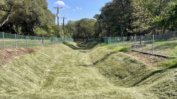 Olympia Hills Drainage Channel with newly installed HydroTurf Z to increase hydraulic capacity.
