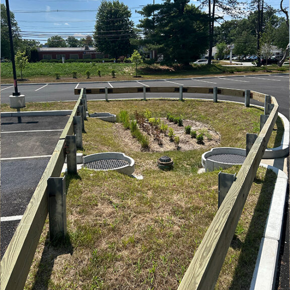 Parking lot surroinding a newly installed FocalPoint Biofiltration and Rain Guardian system.